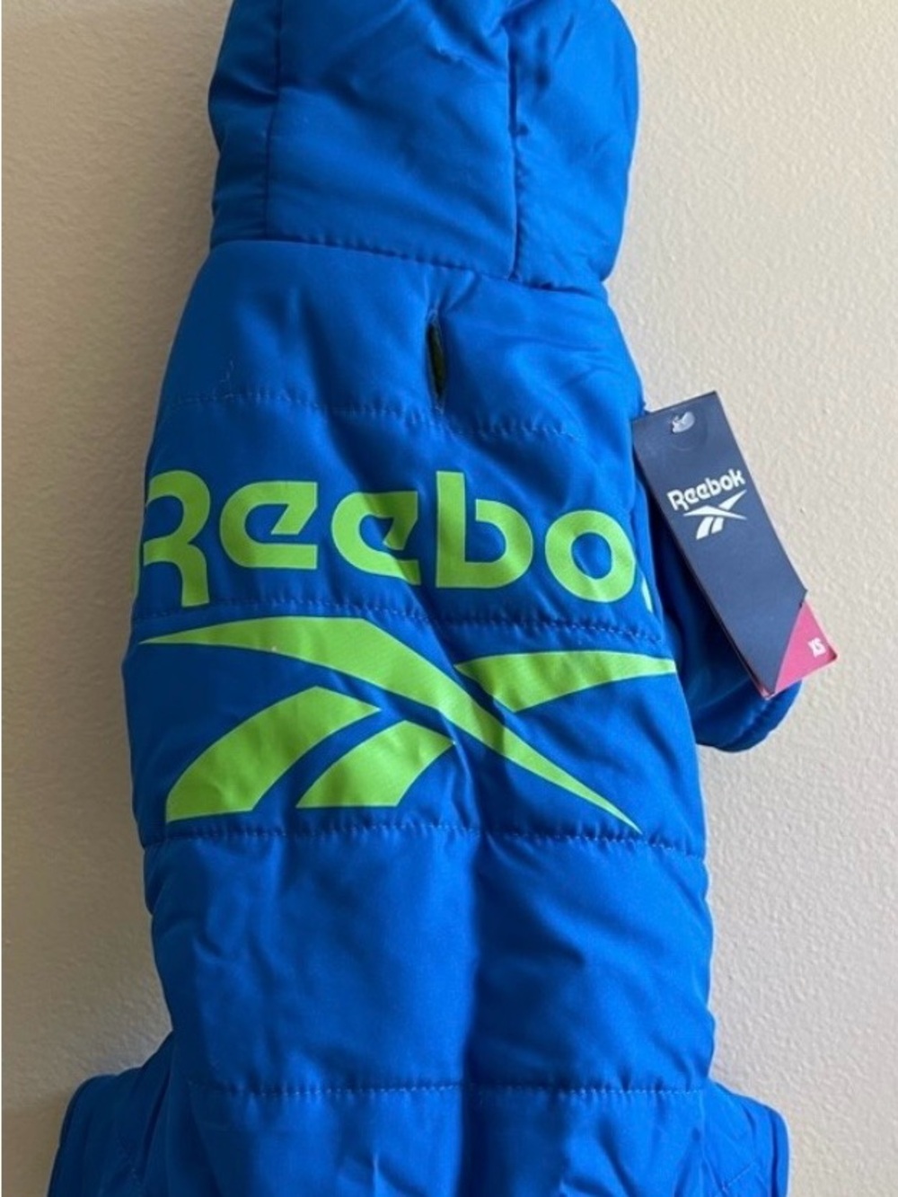Doggie Reebok Blue Puffer Jacket with Neon Green Logo without the tags